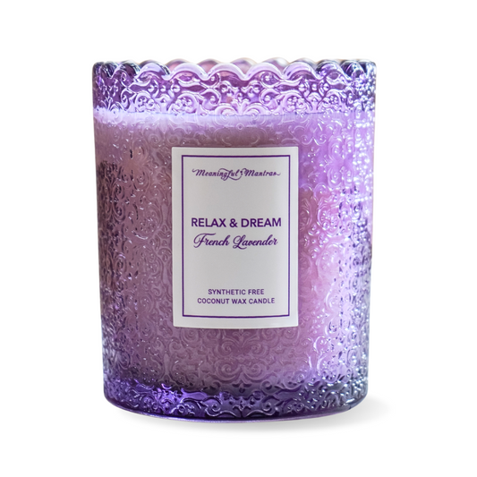 Decorative candle with a purple and pink gradient and 'Meaningful Mantras' label on a white background.