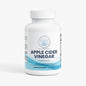 Bottle of Apple Cider Vinegar capsules on a white background