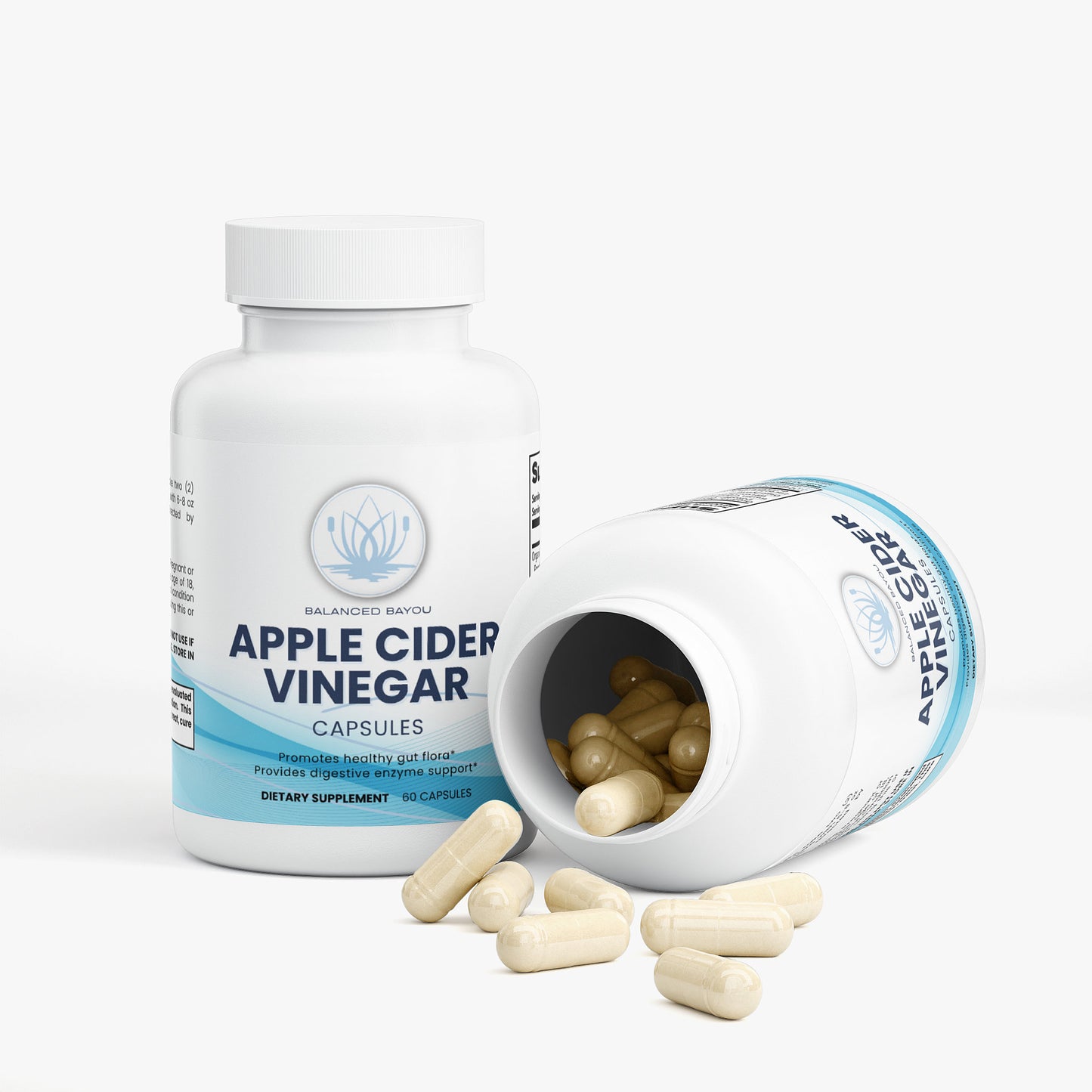 Apple cider vinegar capsules with a bottle and open cap on a white background