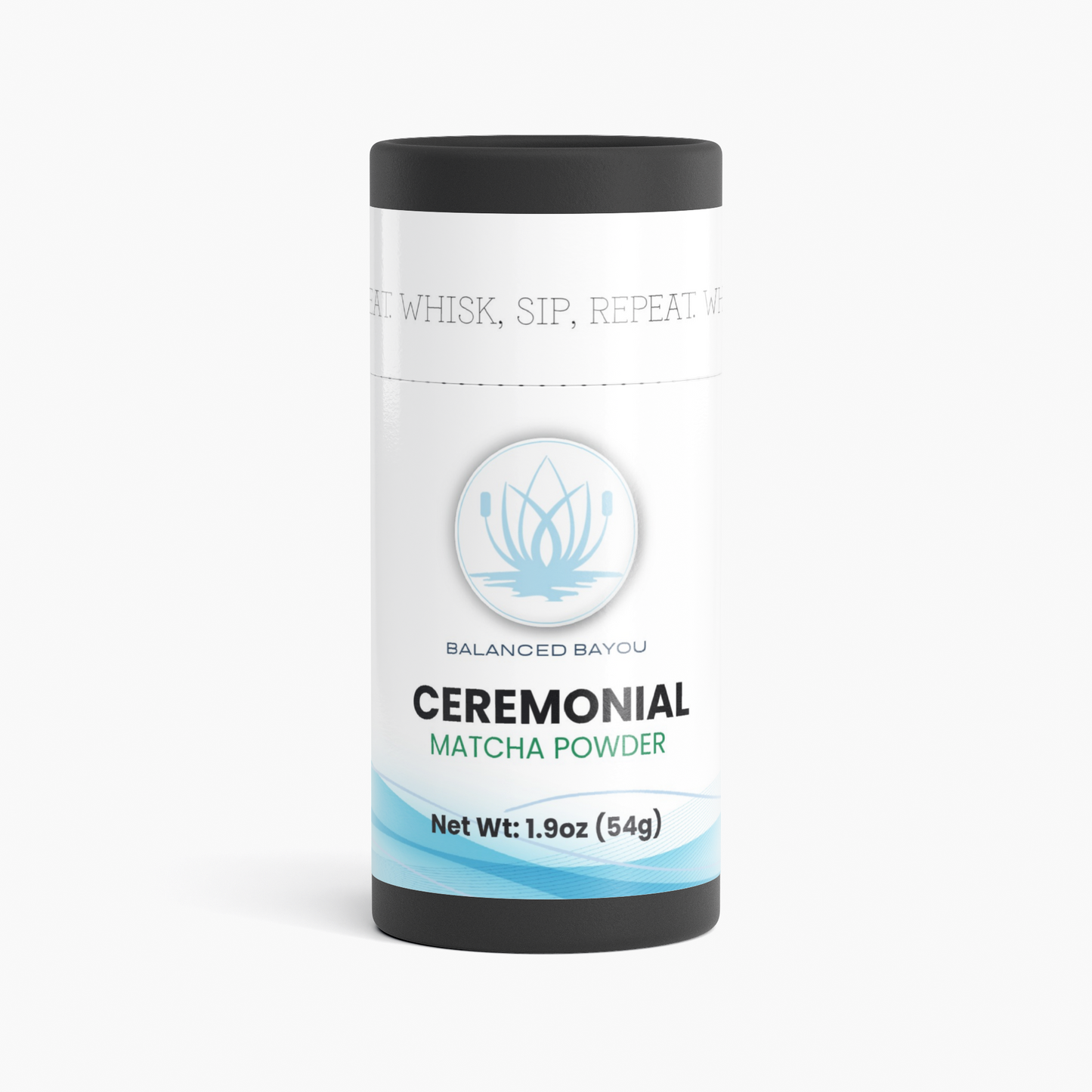 A cylindrical container of Balanced Bayou Ceremonial Matcha Powder, featuring a white label with light blue and black text and graphics, set against a clean white background.