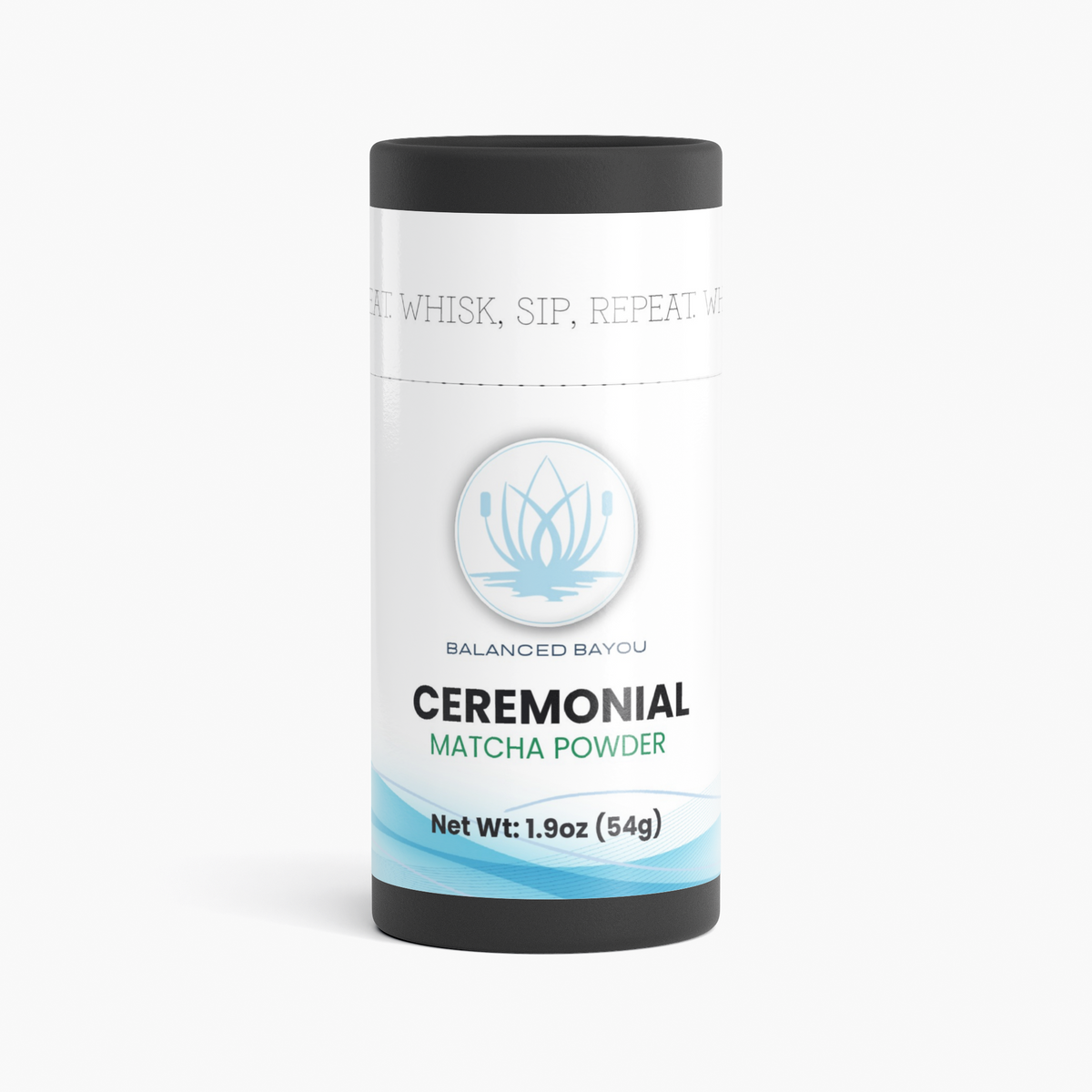 A cylindrical container of Balanced Bayou Ceremonial Matcha Powder, featuring a white label with light blue and black text and graphics, set against a clean white background.