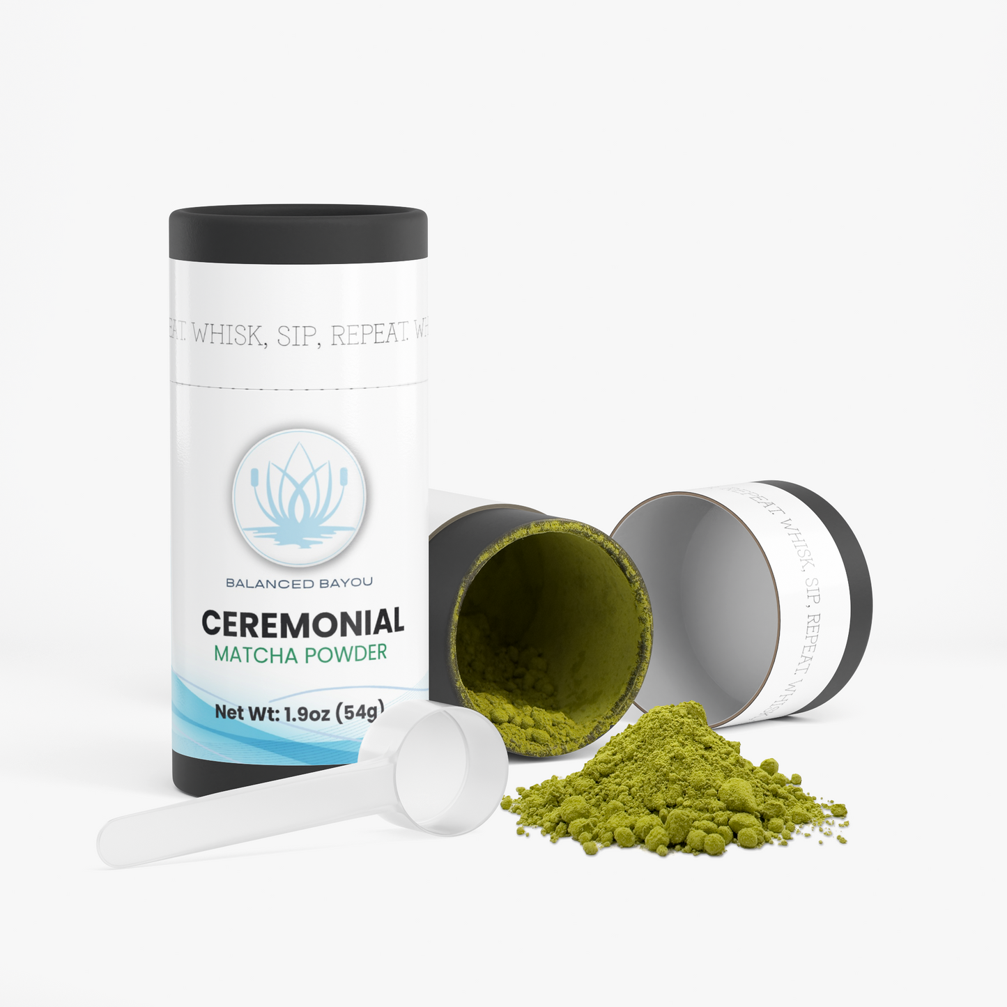 A white and black cylindrical canister of ceremonial matcha powder, shown with a white scoop and a small pile of green powder spilled out on a clean white background. The canister label reads 'BALANCED BAYOU CEREMONIAL MATCHA POWDER'.