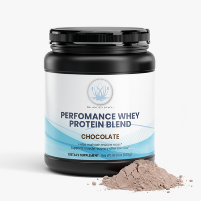 A black plastic tub of Balanced Bayou Performance Whey Protein Blend in Chocolate flavor, shown on a clean white background with a small pile of chocolate-colored powder in front of the label.