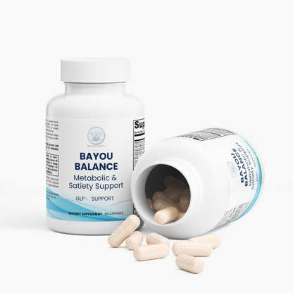 Two white bottles of Bayou Balance dietary supplement capsules on a clean white background, with one bottle standing upright and the other lying on its side showing the capsules inside and a few scattered in front.