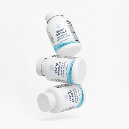 Three white supplement bottles labeled BAYOU BALANCE are floating in a stacked arrangement on a clean white background.