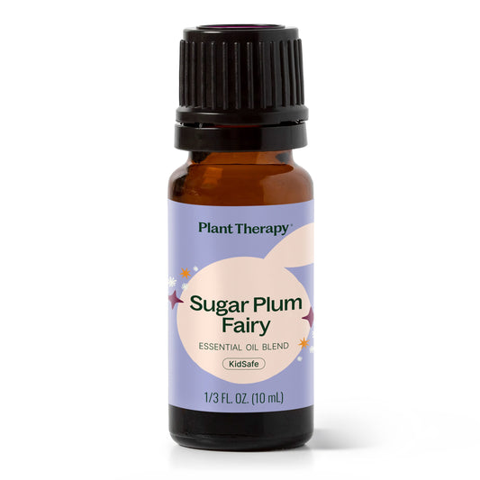 A 10 mL amber glass bottle of Plant Therapy 'Sugar Fairy' essential oil blend with a black ribbed cap and a lavender label, shown on a white background.