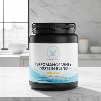 A black plastic tub of Balanced Bayou Performance Whey Protein Blend in Vanilla flavor, featuring a white and light blue label, set against a clean white background.