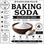 NYC Herbs Baking Soda aluminum-free product packaging on a white background, featuring a wooden bowl of white powder, a small wooden spoon with powder, and multiple benefit icons and text callouts.